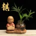 Phật giáo Zen Little Buddha Sáng tạo Chậu hoa Piano Tranh cờ và Thư pháp Gốm sứ thủy canh Cây trồng hoa Chậu hoa văn phòng Bình thủy tinh - Vase / Bồn hoa & Kệ