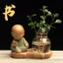 Phật giáo Zen Little Buddha Sáng tạo Chậu hoa Piano Tranh cờ và Thư pháp Gốm sứ thủy canh Cây trồng hoa Chậu hoa văn phòng Bình thủy tinh - Vase / Bồn hoa & Kệ