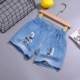 Quần short denim bé trai mùa hè quần nóng 3-4-5-6-7 tuổi trẻ em quần ba phần tư quần đi biển quần bông thủy triều - Quần