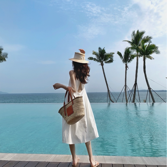 Sanya tourism photo cover flesh thin beach skirt temperament super fairy seaside holiday hanging neck halter strap dress