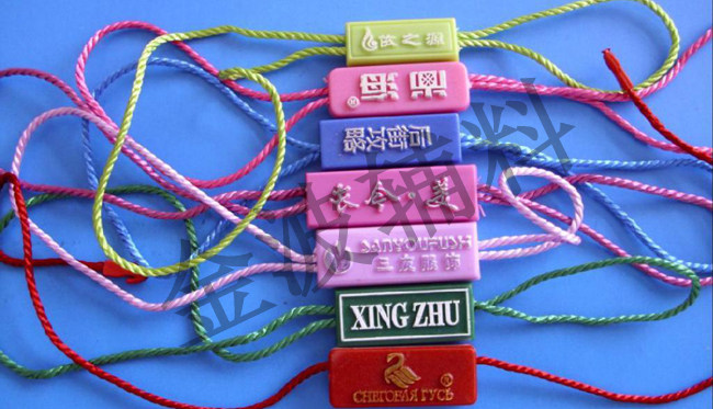 Custom-made clothing hangers, tag hangers, custom-made slings, double-insert universal hangers, clothing slings, hand threading