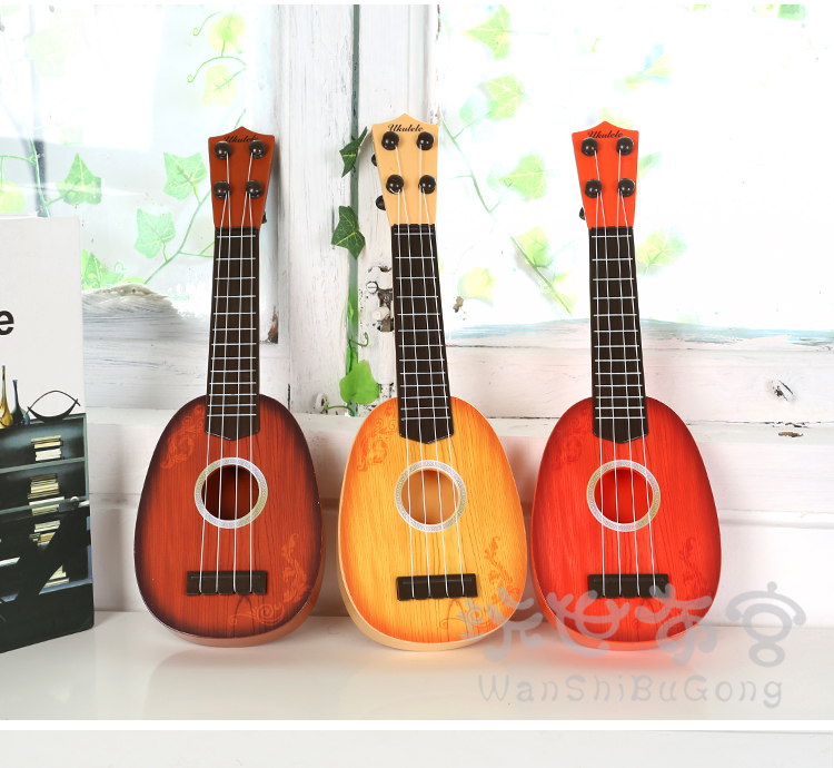 Trẻ em của mô phỏng mini ukulele có thể chơi nhạc cụ đàn piano bé âm nhạc nhỏ guitar nhựa guitar đồ chơi