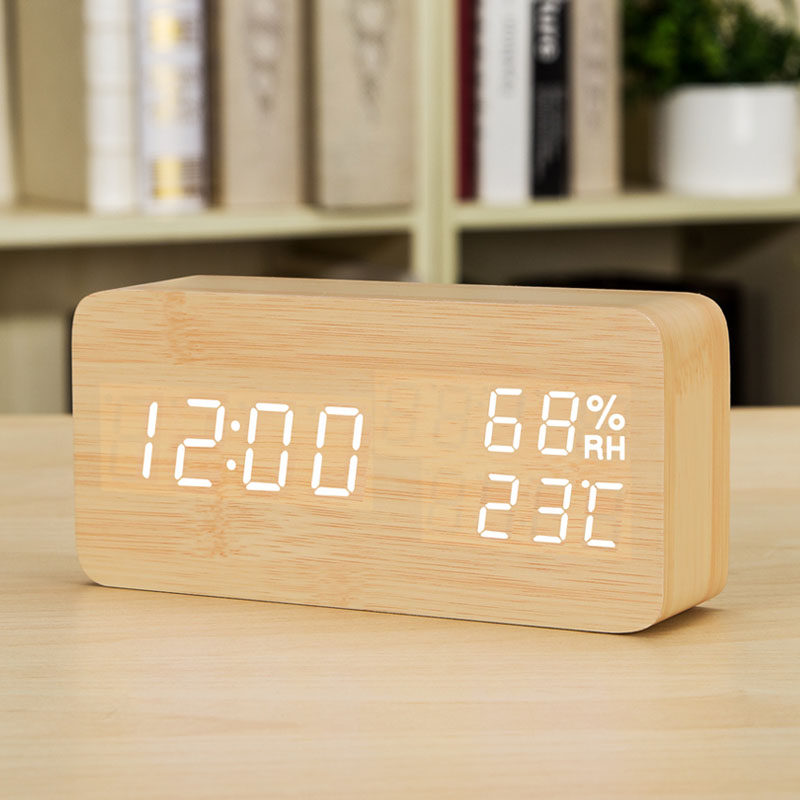 Modern creative alarm clock Charging electronic clock Luminous mute bed clock Wooden thermometer hygrometer Student children's desk clock
