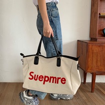 Sports fitness hand luggage bag mens short-distance simple large-capacity crossbody portable canvas business travel bag womens tide