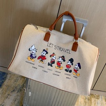 2021 autumn and winter new portable large travel bag womens large capacity canvas business trip short trip shoulder duffel bag