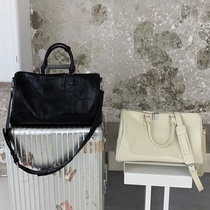 2021 new short-distance travel bag female portable leather large capacity fashion boarding business travel luggage bag male tide