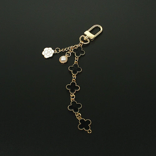 Подвеска, золотая металлическая небольшая сумка, четырехлистный клевер