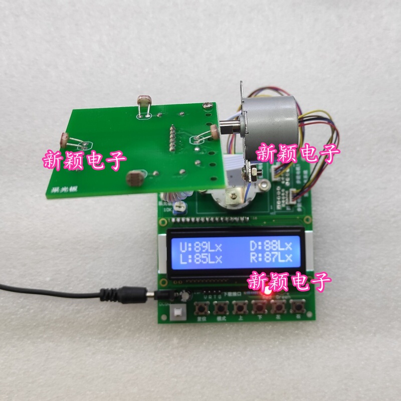 Design of a Solar Tracking Photovoltaic Dual-Axis Tracking System Based on 51 Microcontroller for Automatic Light Source Tracking and Sun Tracking Design of a Solar Tracking Photovoltaic Dual-Axis Tracking System Based on 51 Microcontroller for Automatic Light Source Tracking and Sun Tracking