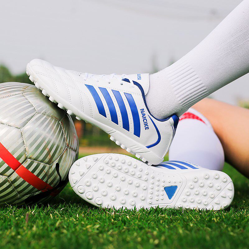 Huaqiang pull back football shoes broken nail boys and girls artificial grass adult primary and secondary school students non-slip flat training shoes