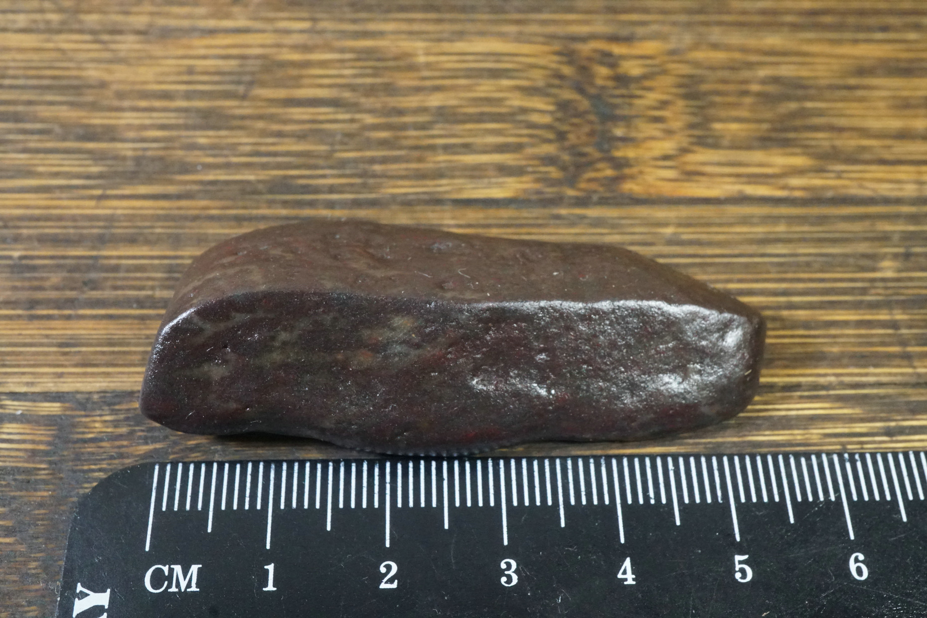 No. 2363 Hami, Xinjiang, is surface red jade bar