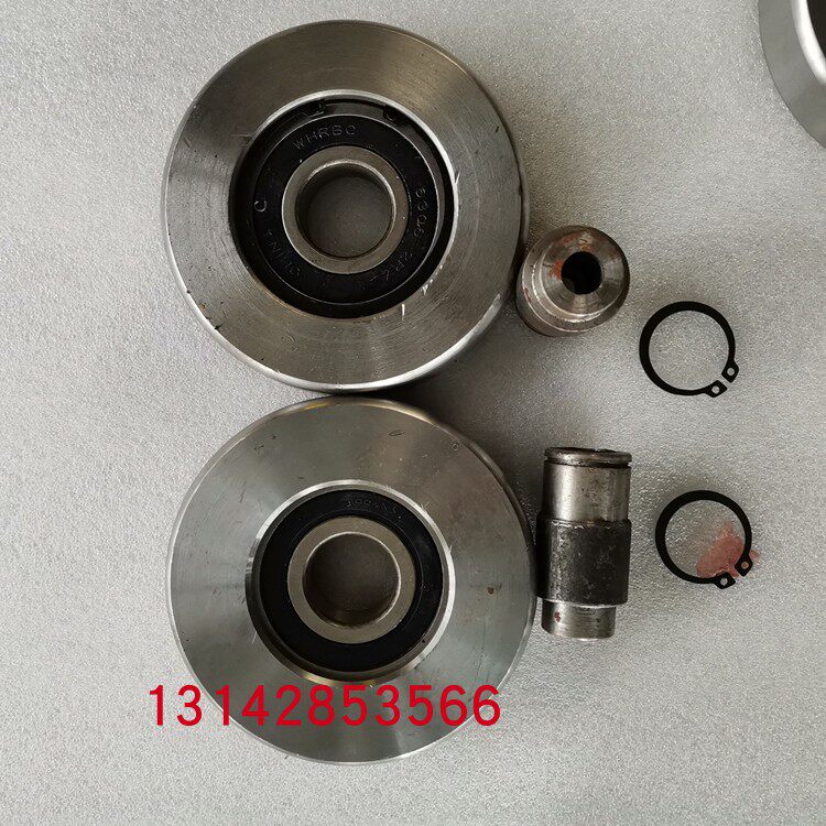 14 14 gauge steel wheel outer diameter 124 mm thick 24 mm of track wheel pointing to a grooved pulley lifting platform machine accessories