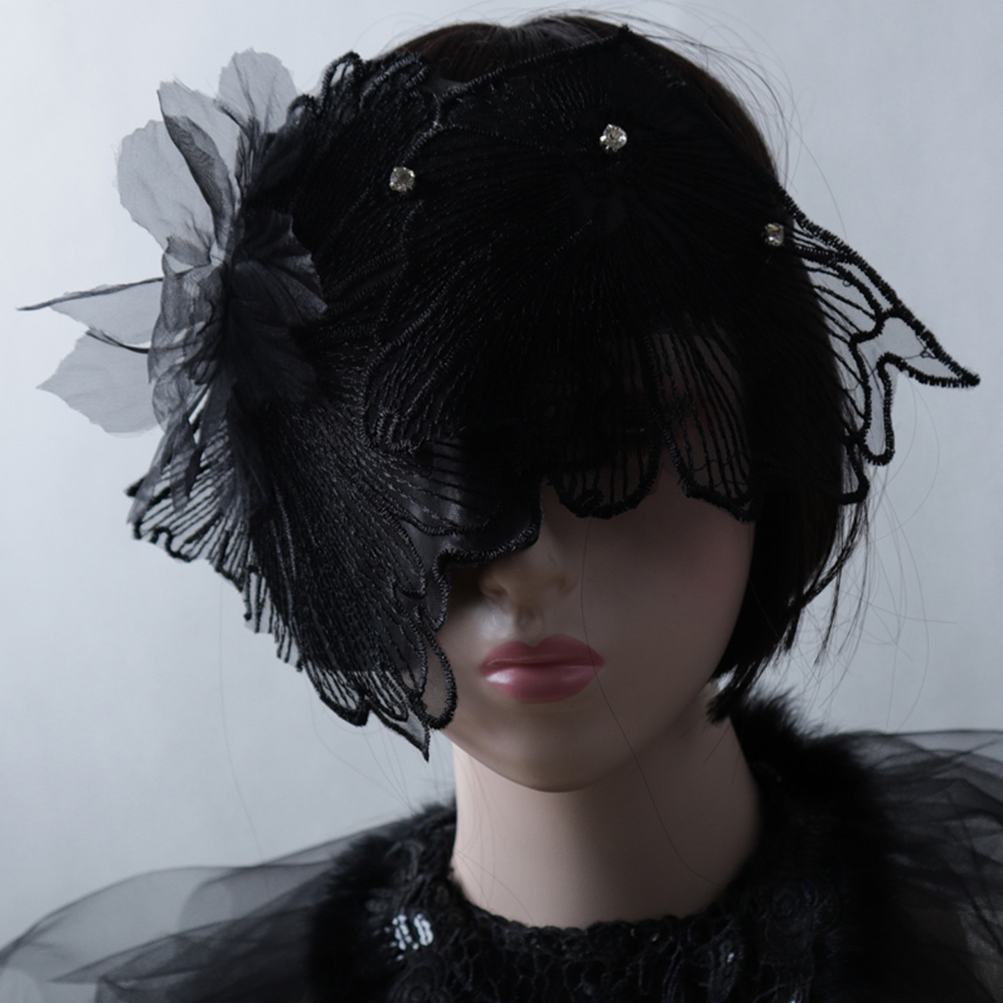 Beautiful woman wearing a half-face veil and lace covering, a masquerade party mask, Halloween eye mask, erotic masquerade.