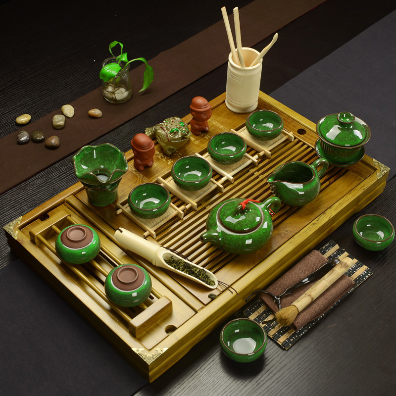 Porcelain god solid wood tea tray of a complete set of kung fu tea set drainage water the draw - out type tea table with beverage holder tray was home