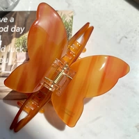 Ацетатный захват-бабочка [карамельный цвет]