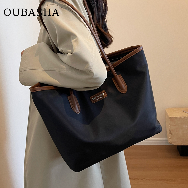 Light Luxury Niche Large-Capacity Bag for Women 2026 New High-End Shoulder Canvas Bag for Work and Commuting Tote Bag Light Luxury Niche Large-Capacity Bag for Women 2026 New High-End Shoulder Canvas Bag for Work and Commuting Tote Bag