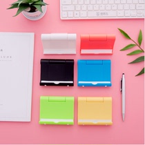 Creative plastic mobile phone holder desktop adjustable Universal Universal pursuit artifact multifunctional clip-on portable
