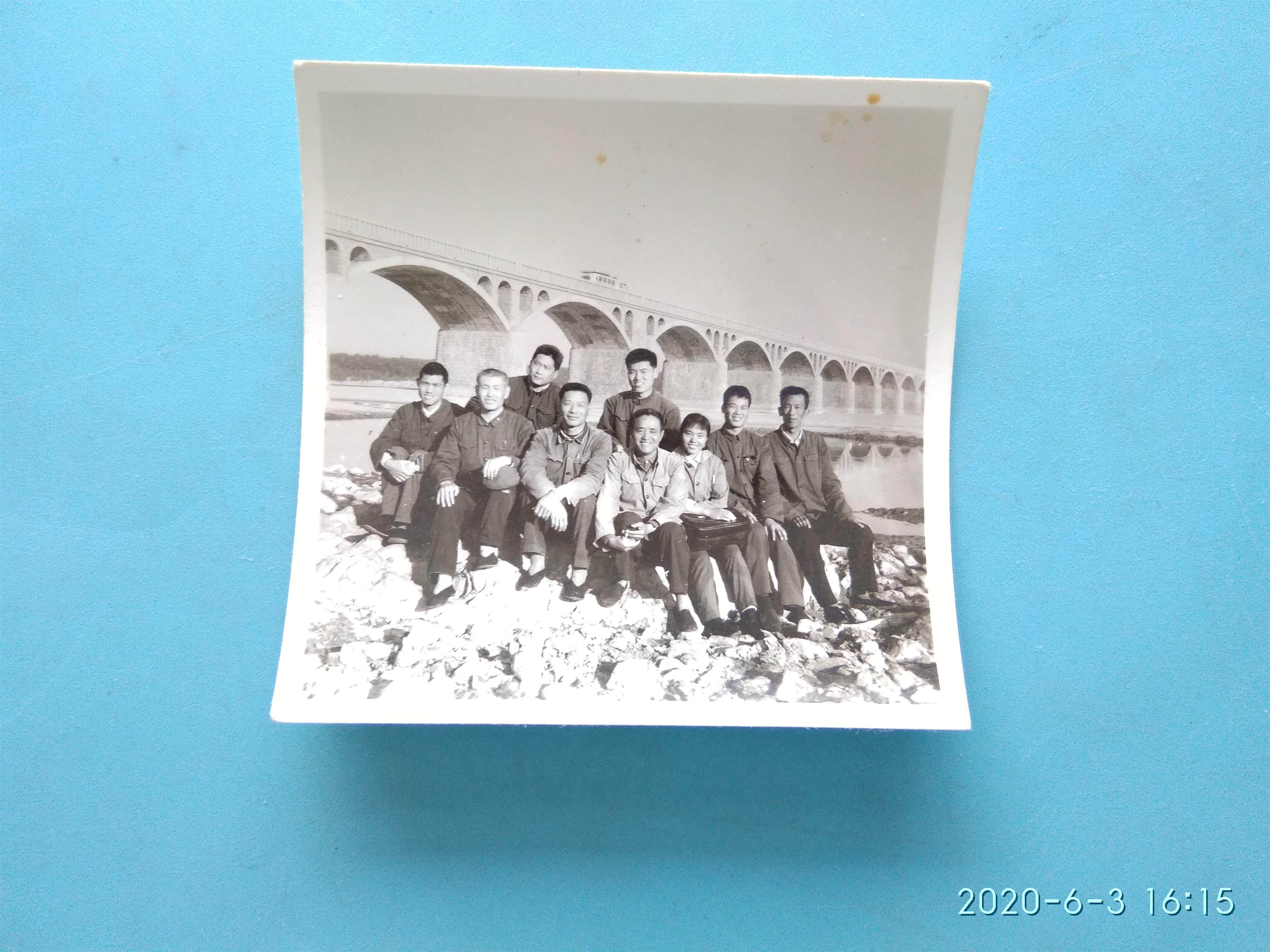 A small group photo under the old photo bridge