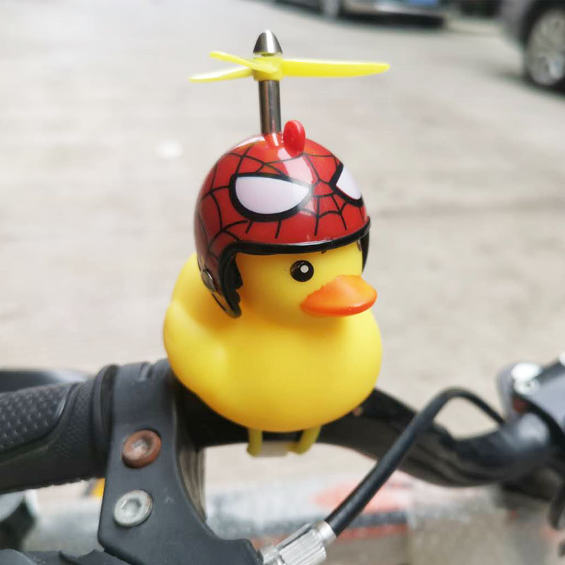 Broken Wind Duck Bike Duck Bell Bell Shake for a small yellow duck wearing safety hat with safety helmet riding horn light