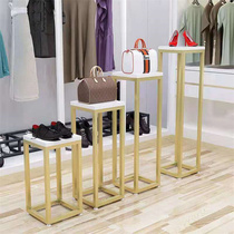 Florists hand holding flower stand multi-meat green planting high and low flowing water table table window iron art flower pot shelf display shelf