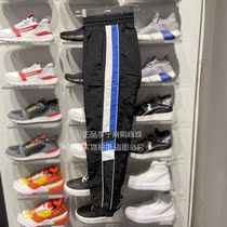 Li Ning sports pants mens 2020 spring new anti-splashing Leisure closed woven sports trousers AYKQ045