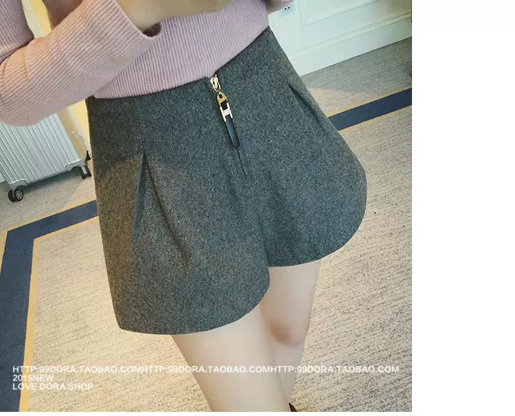 Quần short nữ mùa thu đông mặc quần bốt 2018 mùa xuân mới Hàn Quốc phiên bản quần lửng ống rộng cạp cao len rộng