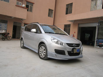 Jianghuai Heyue Rs Modified Body Kit, Hatchback Heyue Rs Shock Absorbers, Front and Rear Lip Side Skirts, Body Kit with Lights and Rear Wing