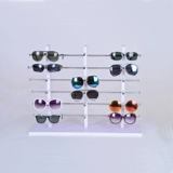 Белый стенд, солнцезащитные очки