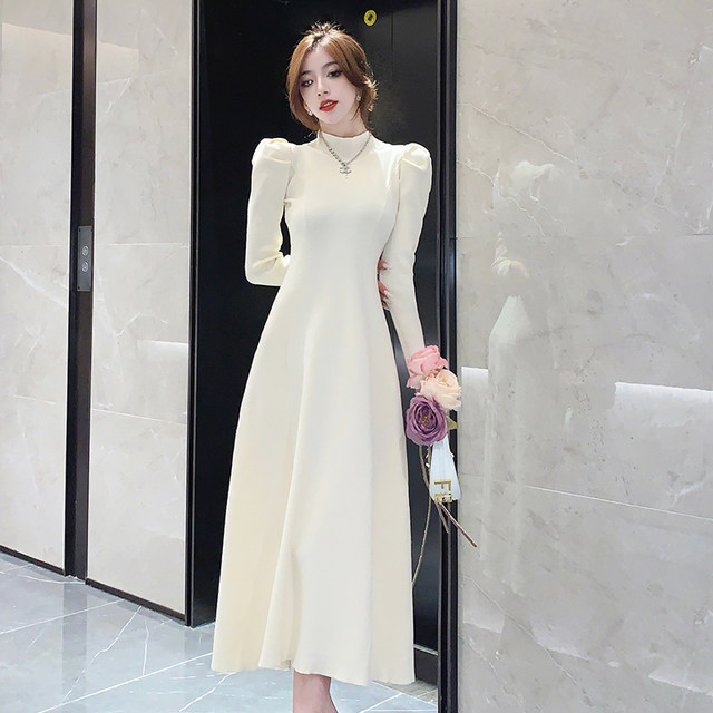 Autumn and winter new French style long section with coat knitted dress women's puff sleeve knee sweater long-sleeved skirt