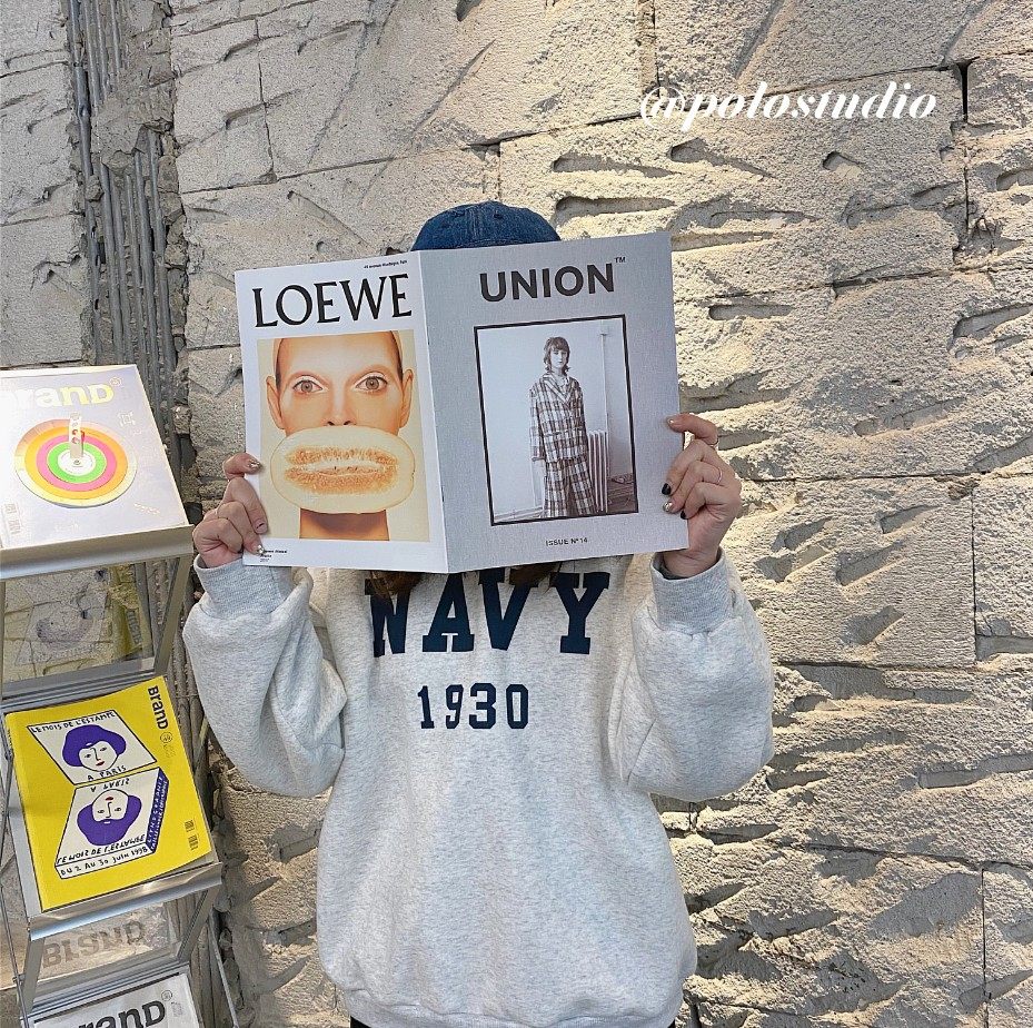 INS Nordic style magazine with the same character photo notebook cover series model clapping hands holding book props