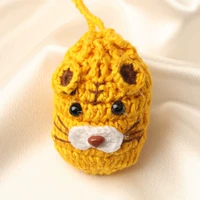 Маленький мешочек для яиц с отделкой «Тигр» и бесплатными имитациями яиц.