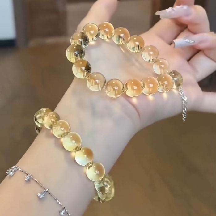 Fortune-Attracting "Honey Light Flowing Gold" Yellow Crystal Bubble Bead Bracelet with Bull's Eye Design Fortune-Attracting "Honey Light Flowing Gold" Yellow Crystal Bubble Bead Bracelet with Bull's Eye Design
