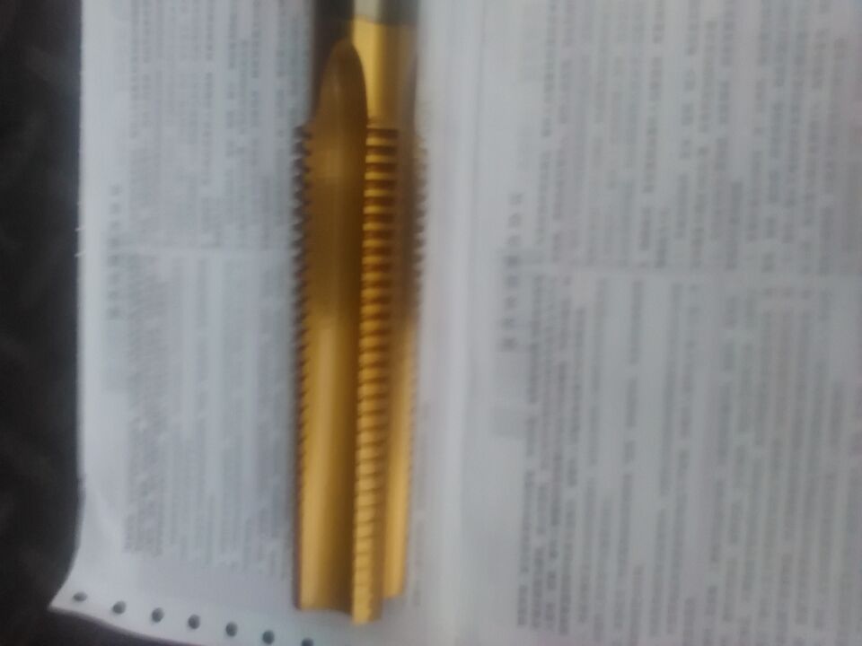 White steel machine with T trapezoidal screw tapping coating T type screw tapping non-labeled Multiguide head T coated titanium T type