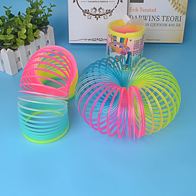 Children's toy magic rainbow spring ring puzzle colorful telescopic elastic ring baby stacking music performance props