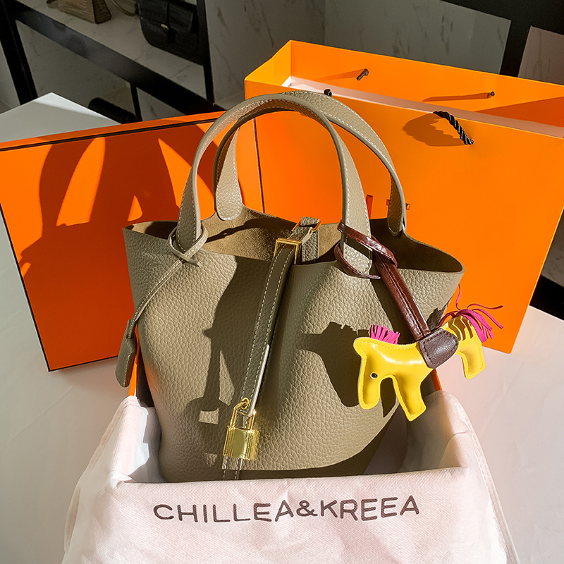 Niche bag 2023 new high-end texture foreign style portable commuter bag large capacity bucket bag vegetable basket girl bag