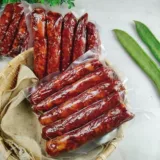 Хунанский фирменный копченый острый колбасная колбаса дым и колбаса острый кишечный кишечный кишечник кишечный мясо из кишечника Хунан Сянси бекон и кишечник Сычуань