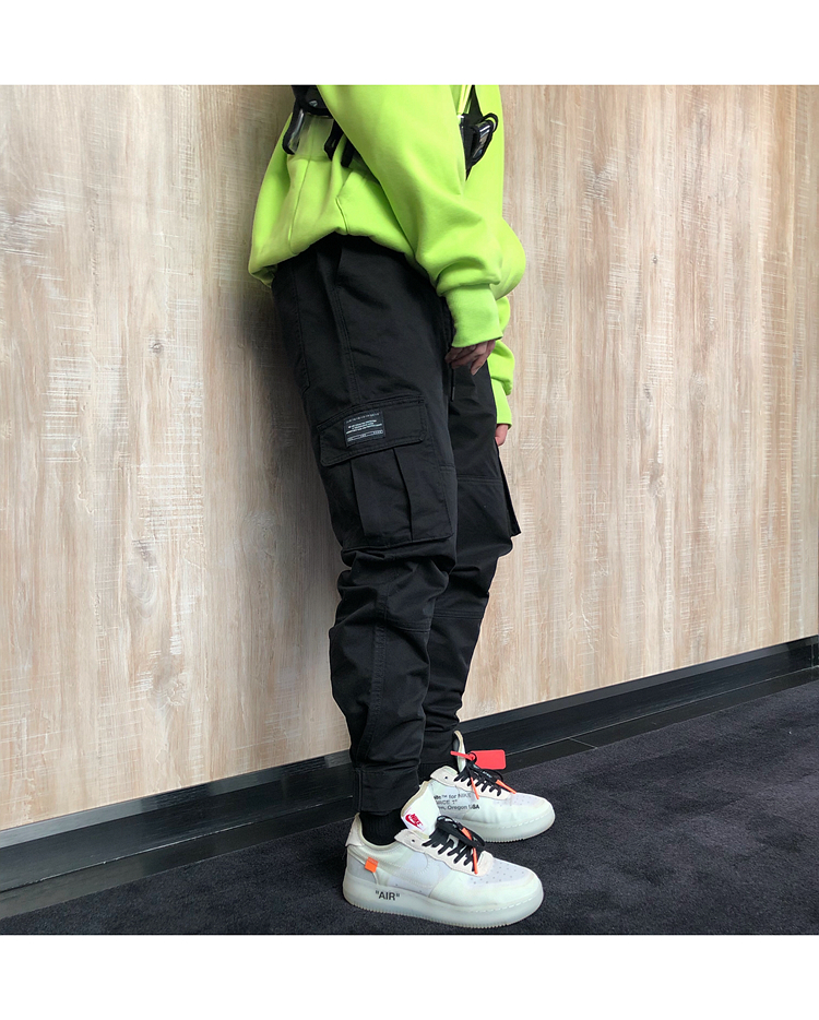 Phong cách Hồng Kông hiphop Mỹ overalls nam và nữ lỏng lẻo bf thẳng quần quần đường phố Harlan túi quần hip hop quần thể thao nam