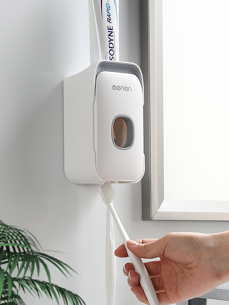 Japan MUJIE MUJIE automatic extrusion toothpaste device toothbrush holder extrusion toothpaste artifact free punching wall-mounted