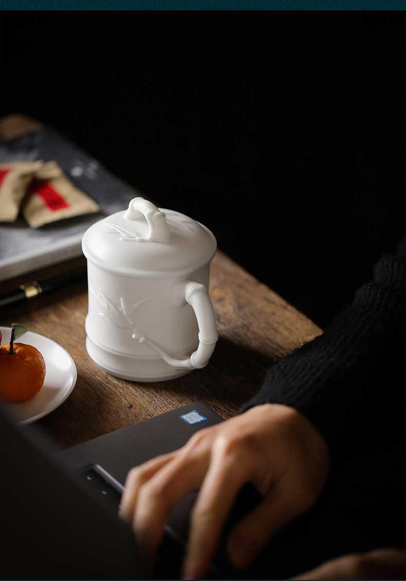 Dehua white porcelain filtering tea cup tea, black tea tieguanyin tea water separation ceramic office cup men and women