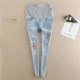 Bà bầu quần jeans mùa hè mới thời trang nâng bụng quần Phiên bản Hàn Quốc khoét lỗ nhỏ là quần lửng chín xuân hè