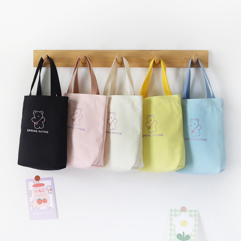 Korean version 2022 new trendy small fresh hand bag simple and cute bear bag girl heart going out portable bag