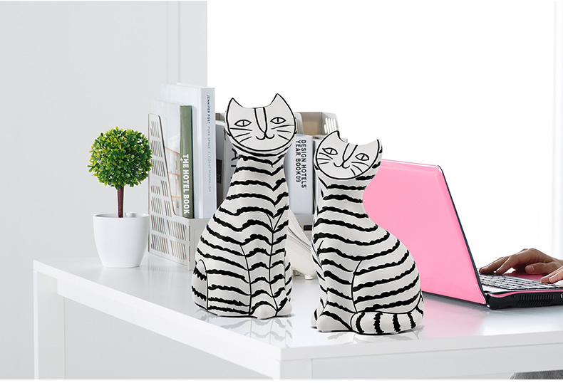 I and contracted ceramic flat face cat sitting room porch place black and white stripe household adornment the example room floor