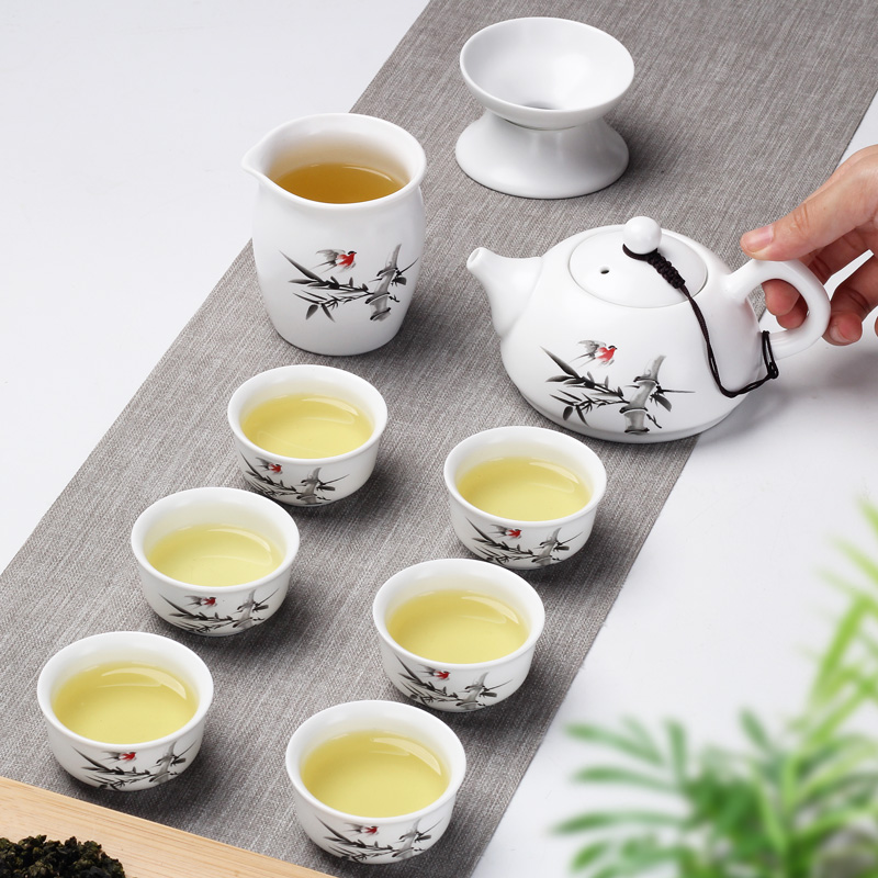 Leopard lam, ceramic kung fu tea set suit household teapot contracted and I tea cups dehua white porcelain small set of office