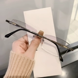 Бесплатные очки Myopia Super Light Pure Titanium можно оборудовать некоторым гранием бриллиантового края для глаз и бесцветными безрамными очками
