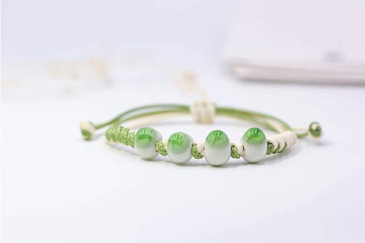 Vòng tay nữ phiên bản tiếng Hàn của cá tính đơn giản học sinh nhỏ gốm sứ biên soạn đá nứt trang sức dưới 10 nhân dân tệ vòng tay trơn vàng 18k