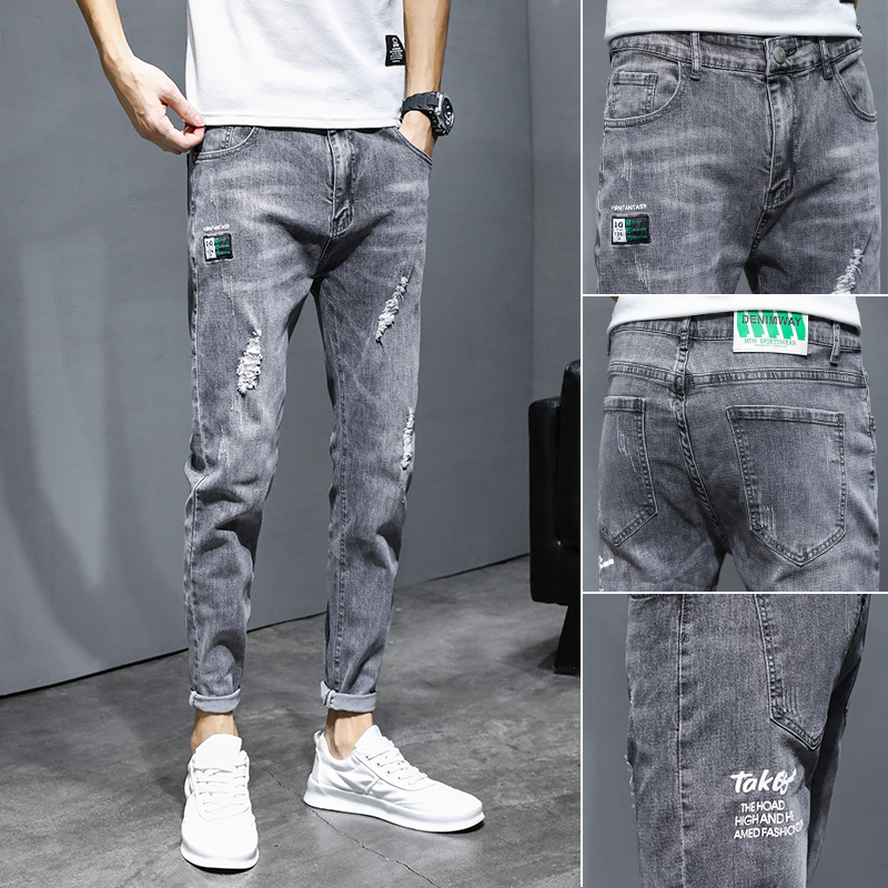 Jeans men's fashion brand autumn winter new slim small foot Korean version of the trend spring and autumn casual hole nine points pants men