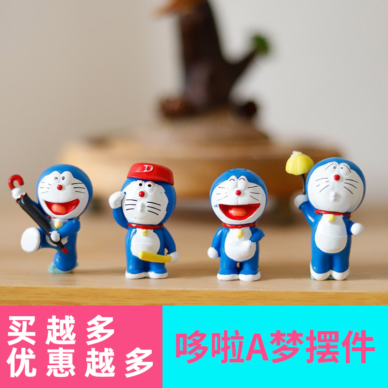 Children's birthday cake decorated with the doraemon of Doraemon Toys 6 suits