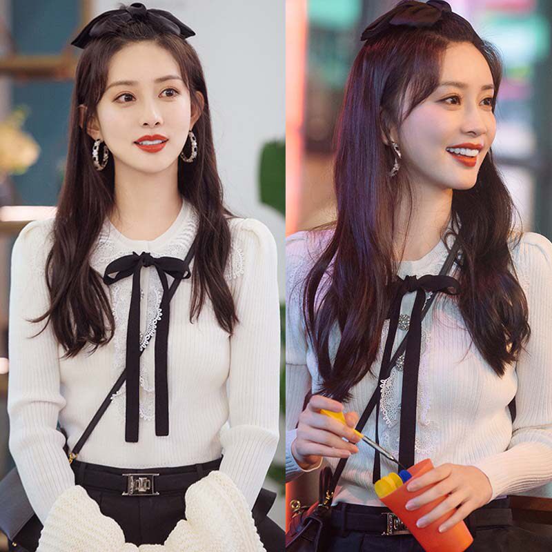 Sandro Moscoloni Menzie also dressed in a butterfly knife sweater design