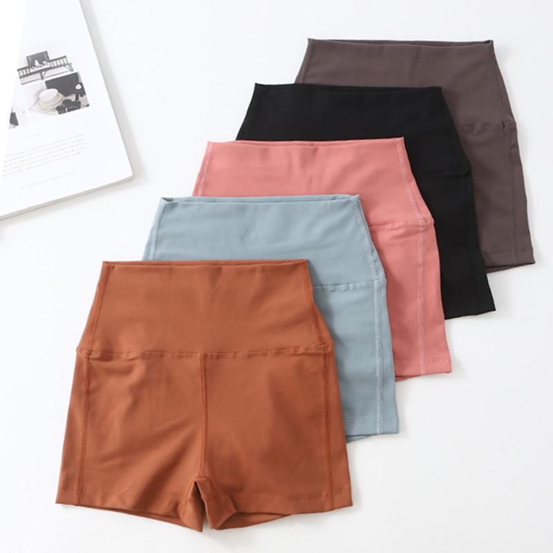 Quần thể dục eo cao tập thể dục nhanh khô chạy bộ yoga đỏ bó sát quần short thể thao thun hông mông quần nữ nóng bỏng - Quần thể thao quần gym nữ