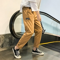Quần yếm Nhật Bản nam thương hiệu đa túi lỏng lẻo siêu cháy quần thường xuyên quần harem quần nam chín điểm quần học sinh quần bò nam