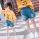 Quần short nữ ống rộng hè 2019 mới trẻ em nước ngoài lỗ gas jeans mặc quần bé gái hoang dã - Quần